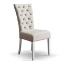 Piękne i klasyczne krzesło tapicerowane w stylu glamour chesterfield z pikowanym oparciem - guzikami lub kryształkami
